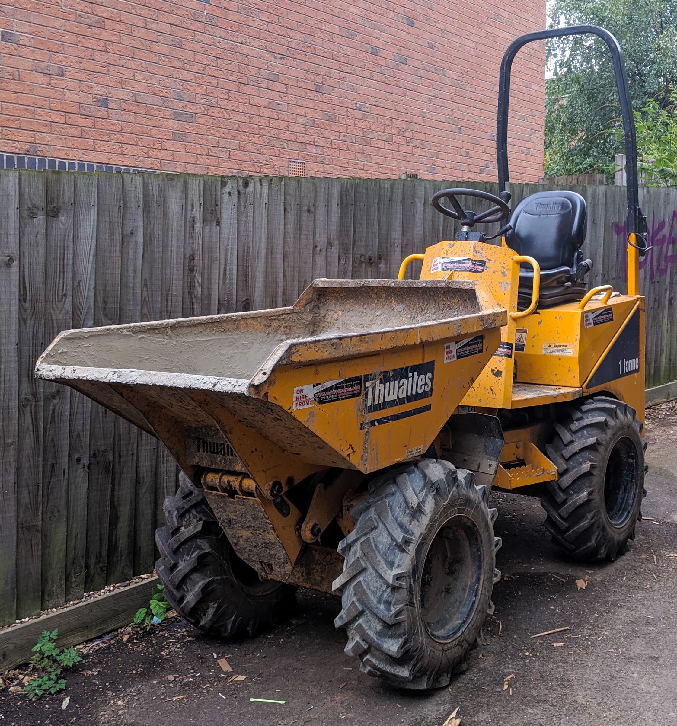 Yellow Thwaites 1-tonne wheeled dumper
